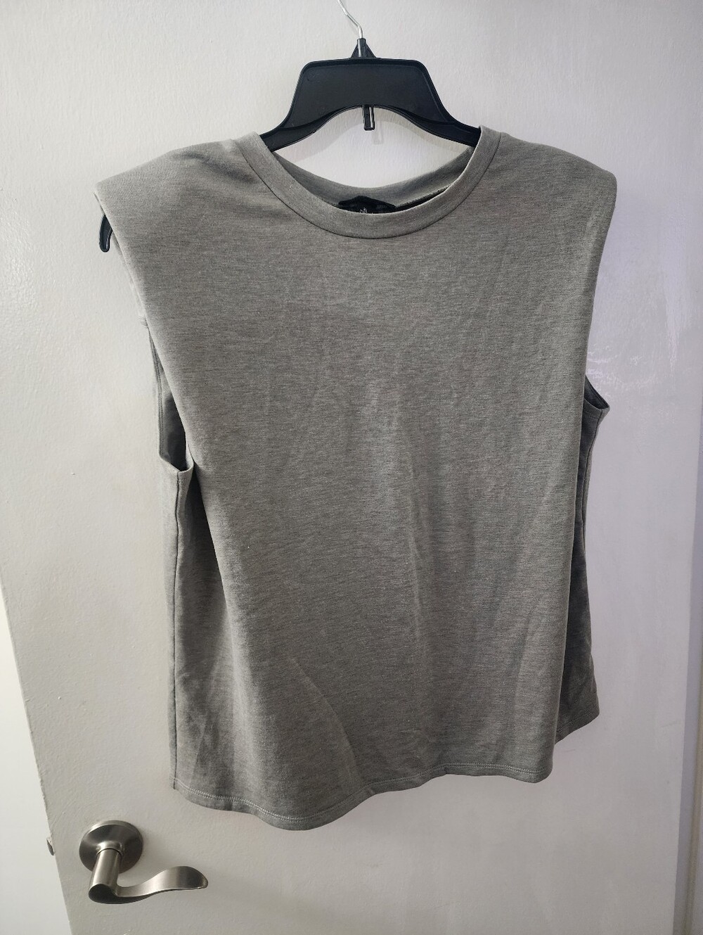 NEW TOP SIZE XLARGE HAS SHOULDER PAD AND OPEN KEY HOLE BACK DESIGN